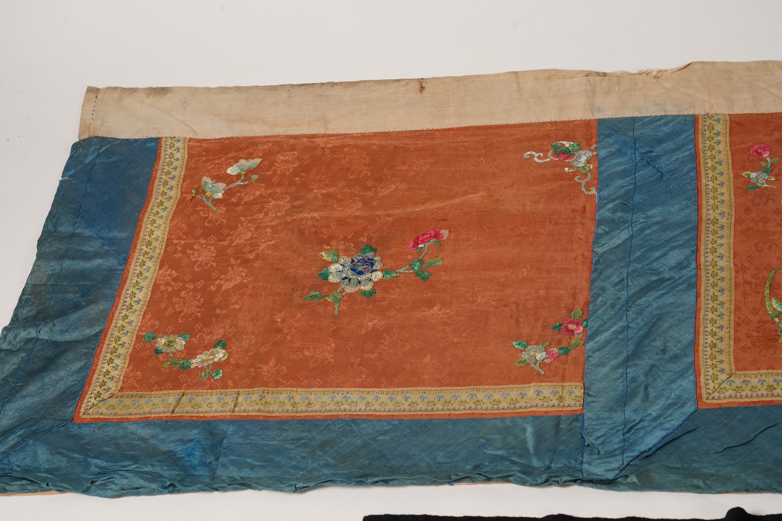 Four Chinese embroidered silk panels, late 19th/early 20th century and a similar Indian panel
